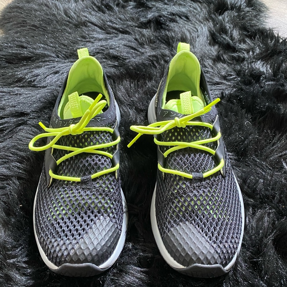 Under Armour woman’s shoes 9.5 black and lime green.